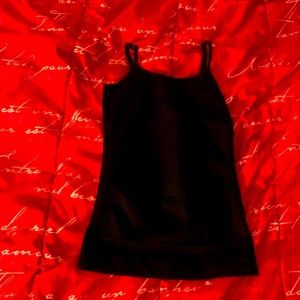 Women’s size medium, black, tight, adjustable strap under tank top